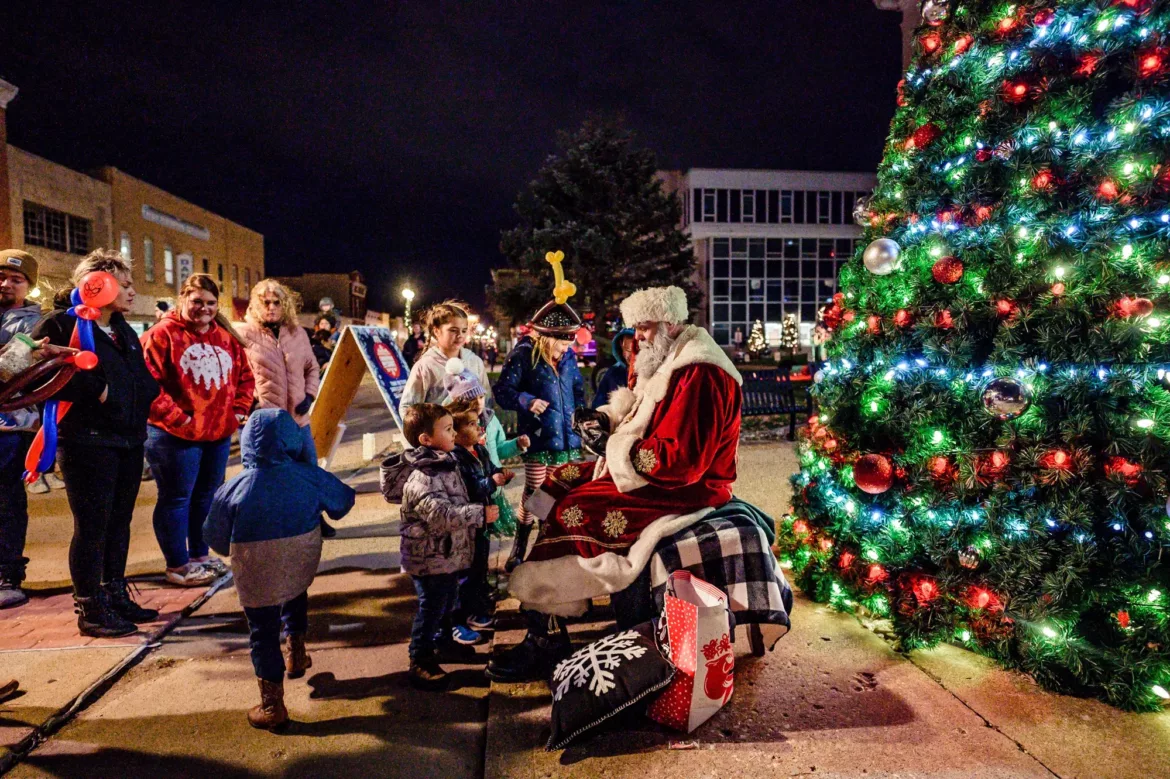 Santa celebrating Christmas in Pekin on Court Street